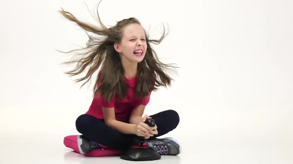 Child Screaming Playing on Console in Online Games. Slow Motion alt