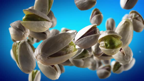 Flying of Pistachios in Blue Background