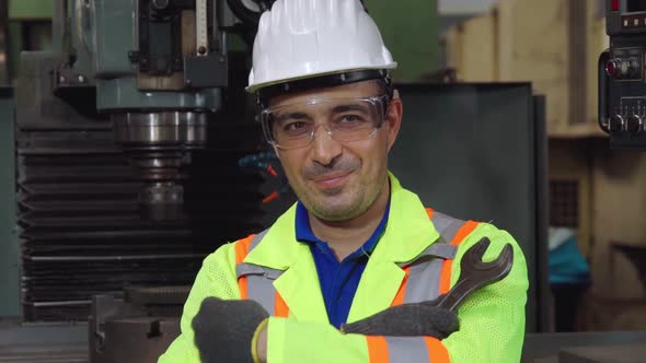 Young Factory Worker or Engineer Close Up Portrait in Factory