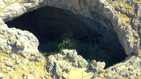 Trees on Sinkhole Akmechet Cave in Shymkent Kazakhstan