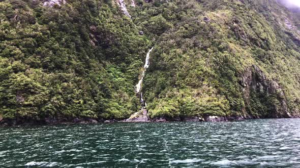 Milford Sound Fiordland. Natural waterfalls at Milford sound National park, New Zealand