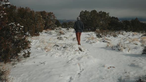 Adventuring in the wild with snow on the ground.