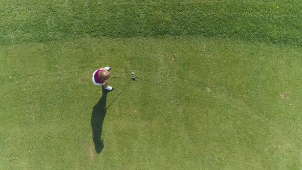 Summer Day Woman Playing Golf Hits the Ball Aerial View of Golf Course in Forest Area Green Lawn