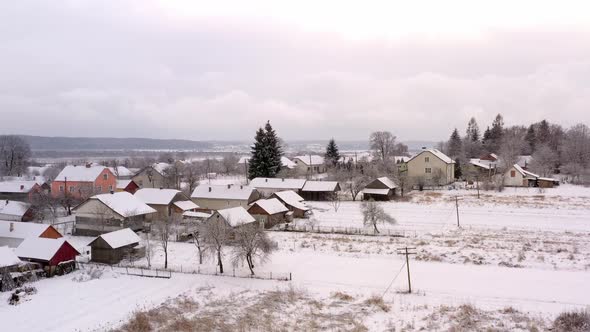 Winter in village, many snow. Beautiful winter landscape