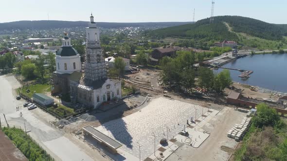 Aerial view of reconstruction of old church with square 17