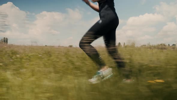 Girl Runner At Summer Before Triathlon Competition. Attractive Woman Run. Fit Woman Cardio Training.