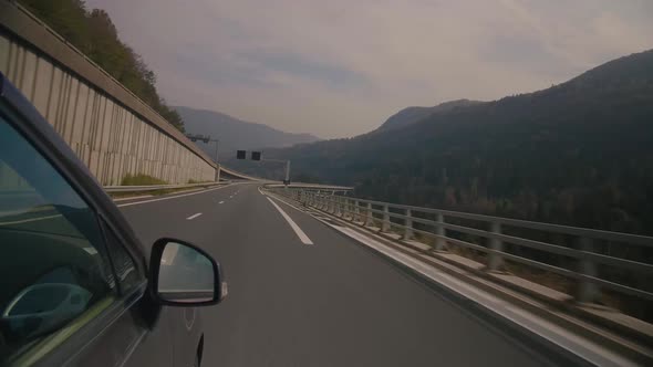 Car Driving on the Swiss Highway View.