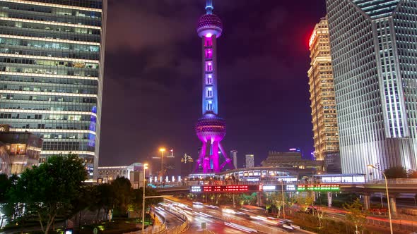 Shanghai Heavy Street Traffic Timelapse at Night Zoom Out