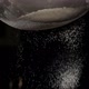 Closeup of White Flour is Falling Through a Steel Sieve on Black Background - VideoHive Item for Sale