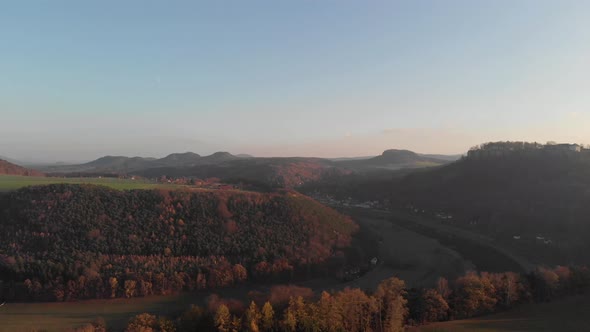 AERIAL: Sunset of Sandstone mountains and Elbe river of Saxon Switzerland