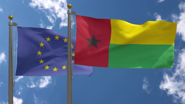 European Union Flag Vs Guinea Bissau Flag On Flagpole