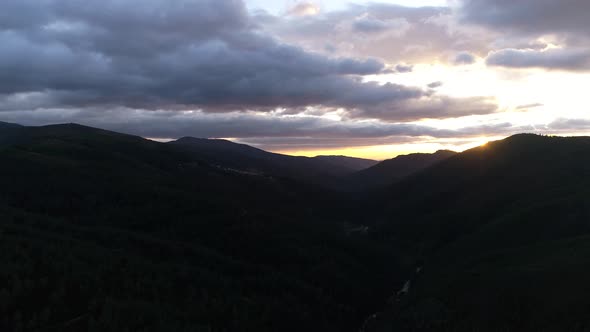 Sunset in the mountains clouds