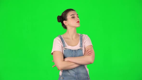 Lovely Girl Is Very Offended and Looks Away on Green Screen