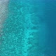 Dive boat over tropical coral reef and turquoise blue water, aerial view - VideoHive Item for Sale