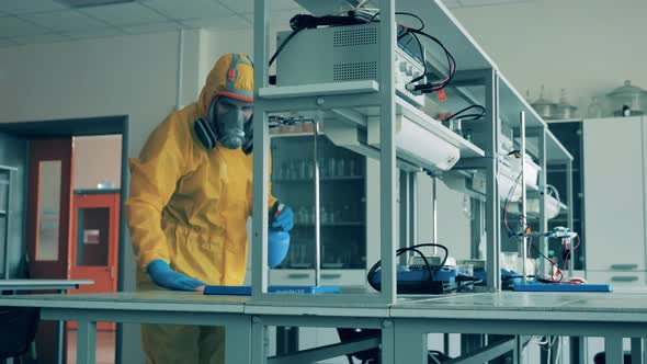 Laboratory Equipment Is Getting Disinfected By a Specialist