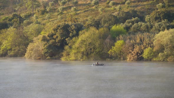 Fisherman in Guadiana river in Portas de Rodao, Portugal