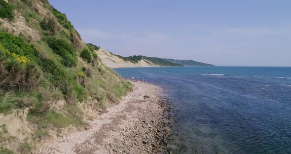 Top View of People Dancing on the Beach at the Cape of Rodon