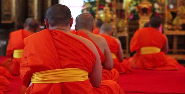 Buddhist Monks Pray In Temple 4