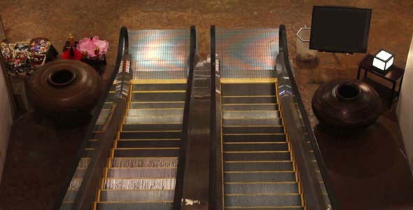 Escalator in Shopping Mall Center