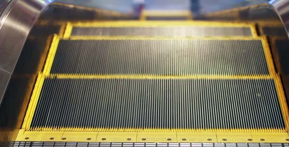 Escalator in Shopping Mall Center