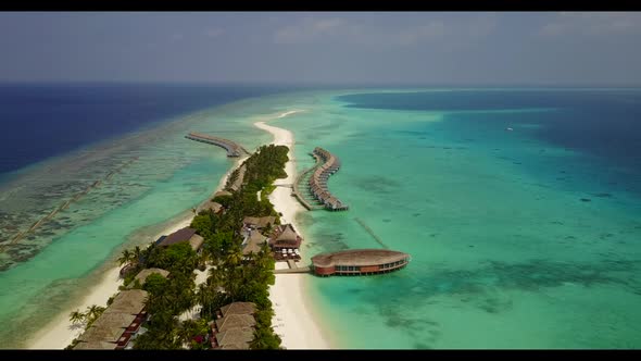 Aerial drone view tourism of marine seashore beach journey by blue ocean with white sandy background