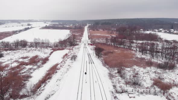 Empty railroad tracks in winter