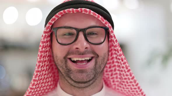 Close Up of Young Arab Businessman Smiling at the Camera 