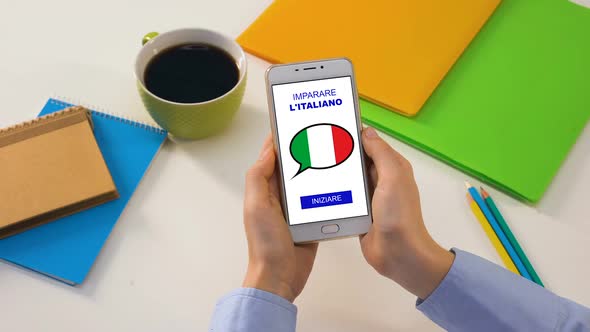 Italian Language Application on Smartphone in Persons Hands Online Education