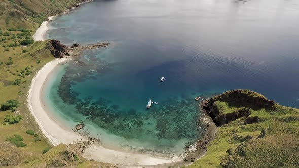 Flying in Komodo Island in east IndonesiaPadar Island and Pink beachMajestic point of aerial view