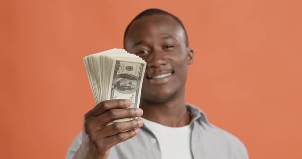 Happy Young Black African American Man Showing Fan of Money