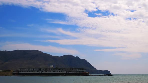 Old Ship Aground Near the Shore