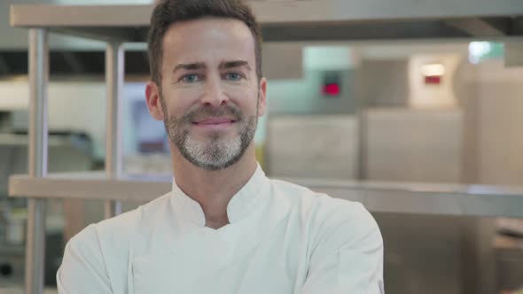 Chef standing in commercial kitchen