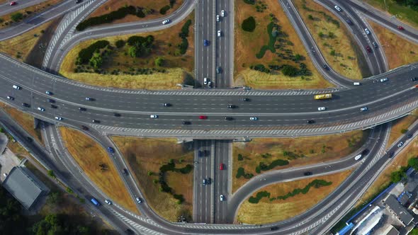 Aerial View of Highway and Overpass in City on a Cloudy Day