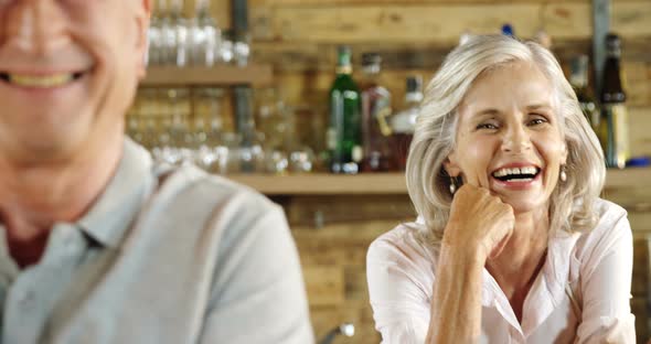 Senior couple smiling in the cafe 