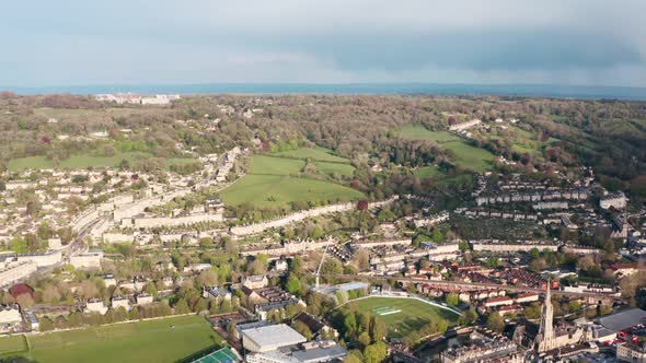 Drone shot over Western Bath city at sunset