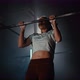 Girl Shakes Muscles and Pulls Herself Up on a Horizontal Bar in Gym - VideoHive Item for Sale