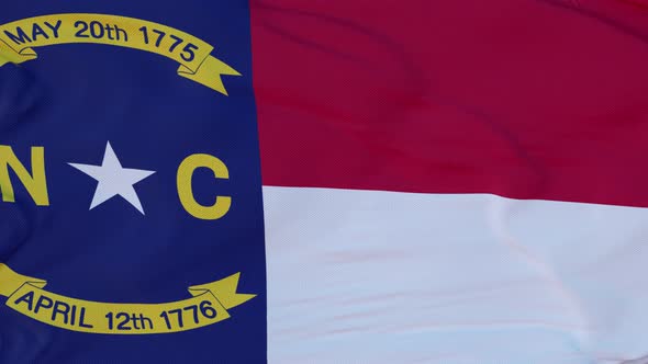 Flag of North Carolina State Region of the United States Waving at Wind