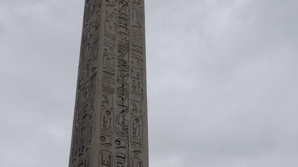 Famous  Luxor Obelisk on Concorde square in French capital Paris slow tilt 4K 2160p UltraHD footage 