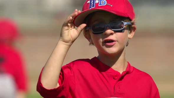 Kids playing little league baseball