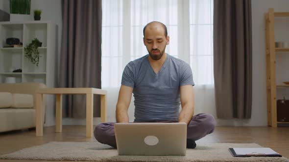 Man Talking with His Friends on Video Call