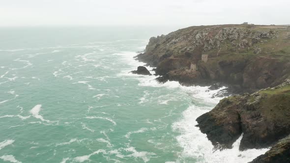 Aerial pass along the Cornwall coastline where the National Trust keeps the tin mine buildings open