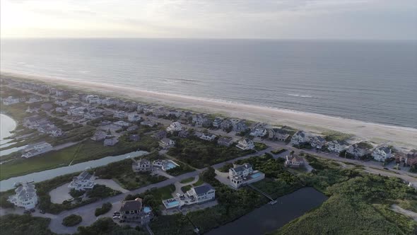 Aerial of Dune Rd Houses by the Beach in Westhampton New York