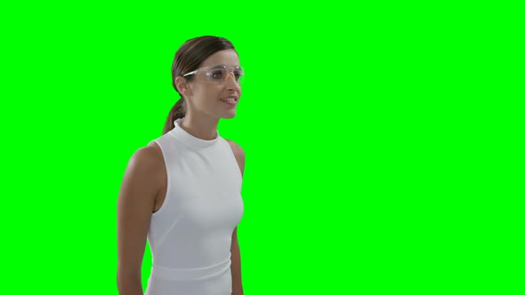 Businesswoman wearing futuristic eyewear while using digital screen