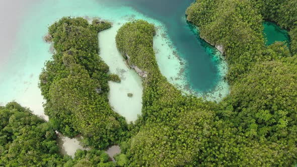 Triton Bay With Turquoise Sea And Green Tropical Trees In Kaimana Islands. 