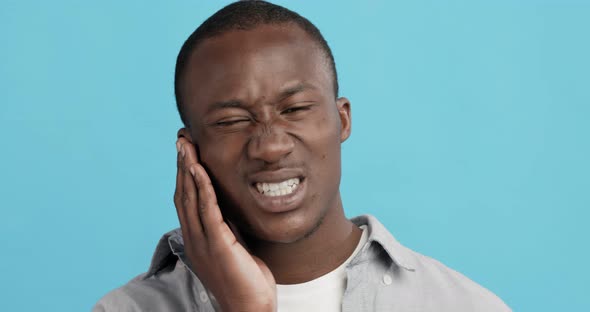 African American Guy Suffering From Strong Tooth Pain