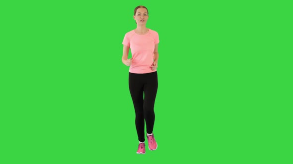 Running Fit Fitness Sport Model Jogging on a Green Screen Chroma Key
