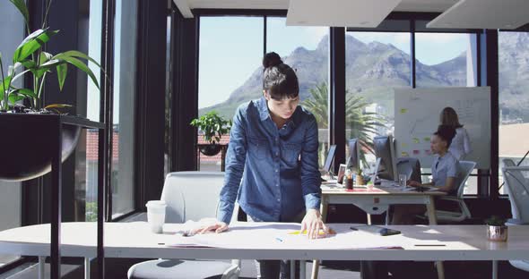 Young woman working at the office