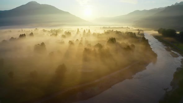 Drone Over Ethereal Misty Landscape Of Zell Am See At Sunrise