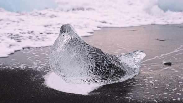 Surf Splashing Over Ice on Diamond Beach Iceland