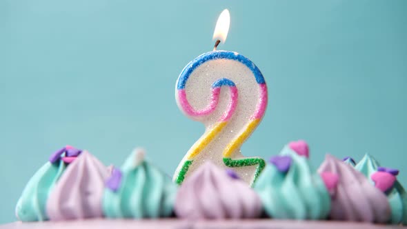 Birthday Cake with Birthday Candle on Color Background